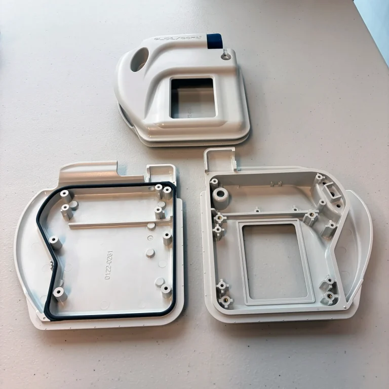 Hermetic sealing via elastomer overmolding.