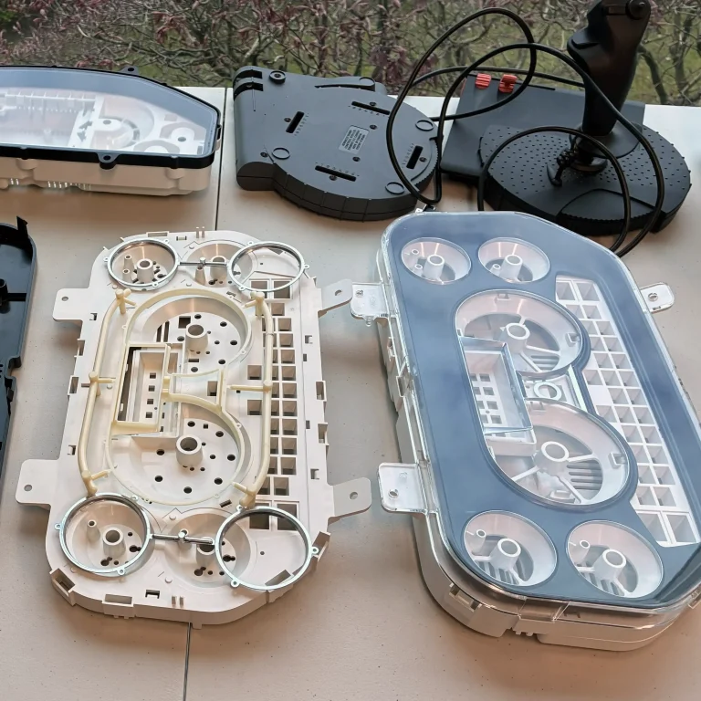Automotive dash console assemblies.
